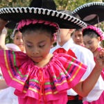 Girls and boys dancing Baile Folklorico at National Night Out