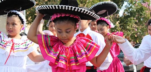 Girls and boys dancing Baile Folklorico at National Night Out